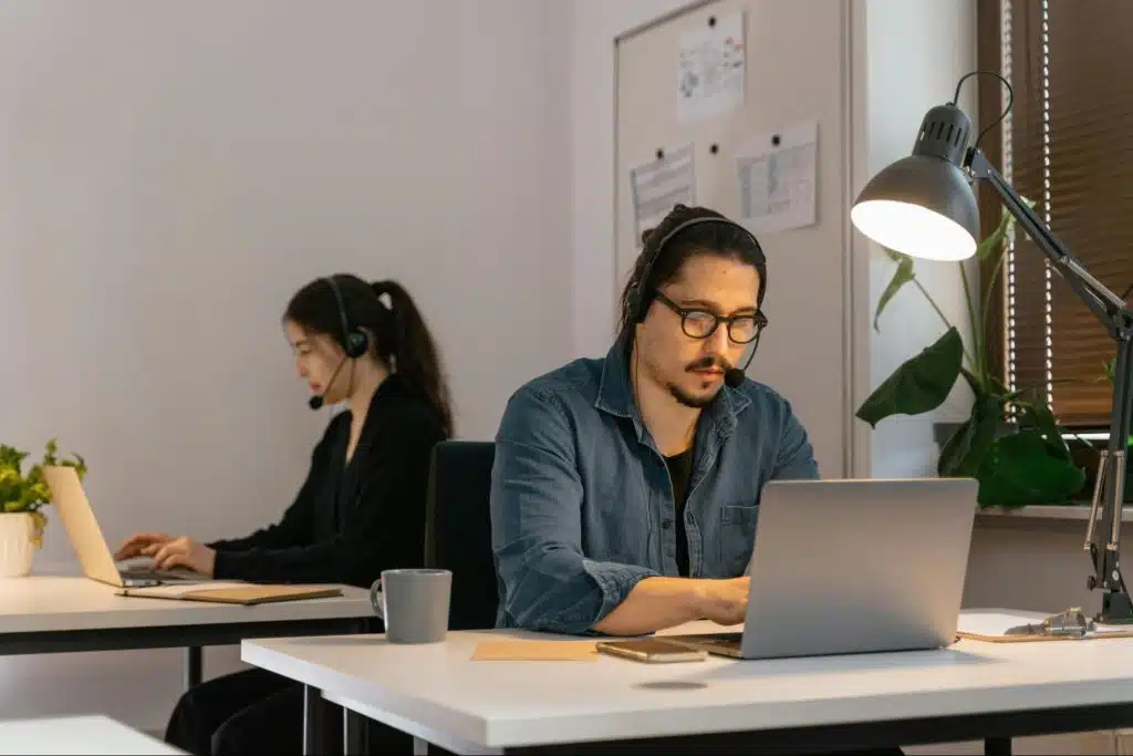 A man and woman busy working