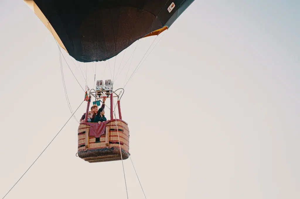 A couple in a hot air balloon