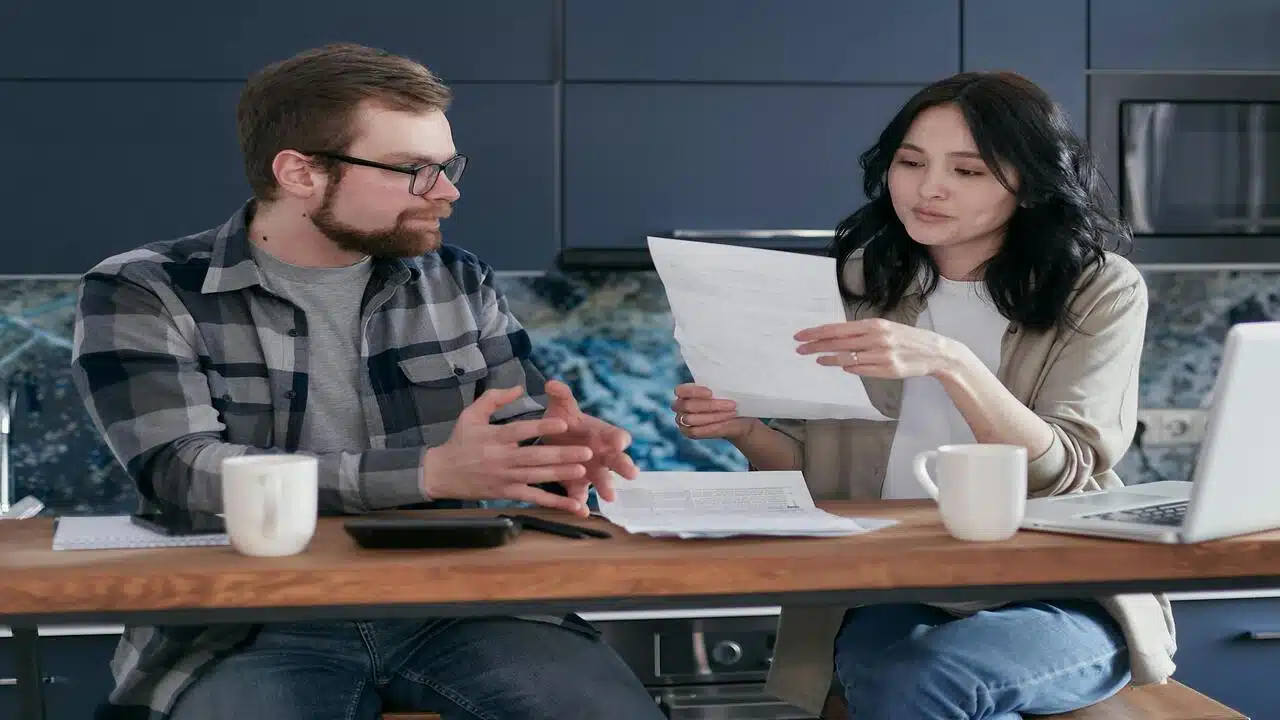 Couple working with a laptop