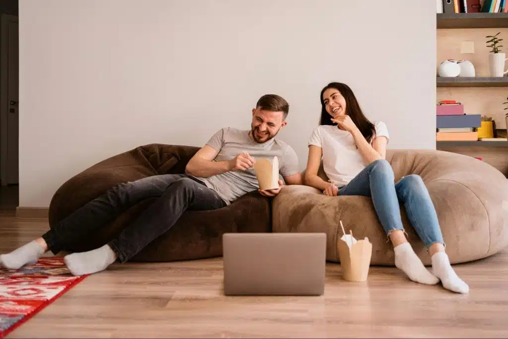 A man and woman eating together