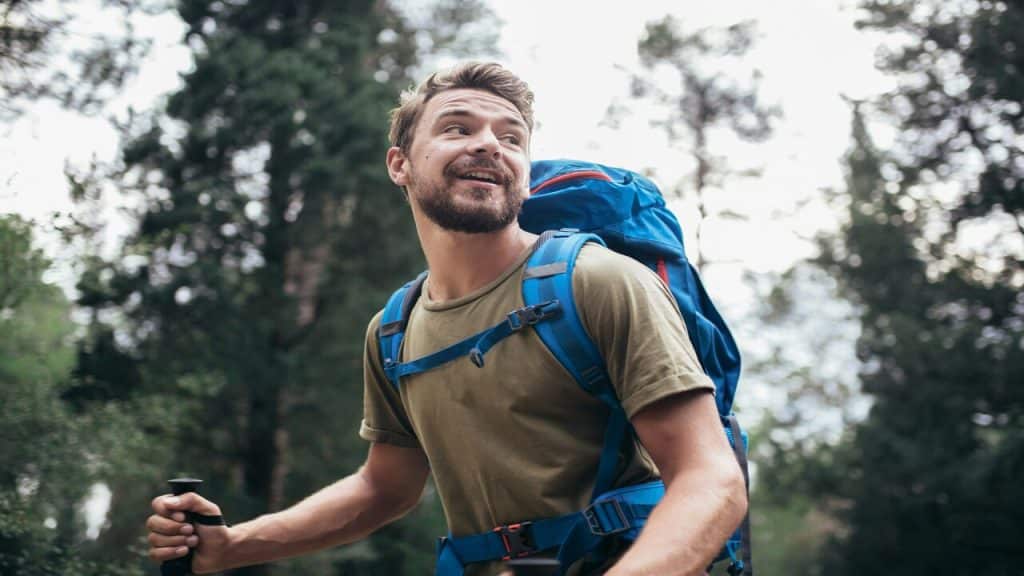 A man hiking in the woods