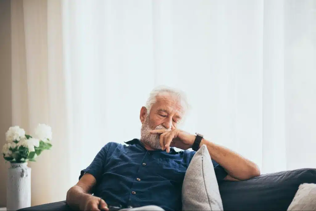 A man sitting at the couch