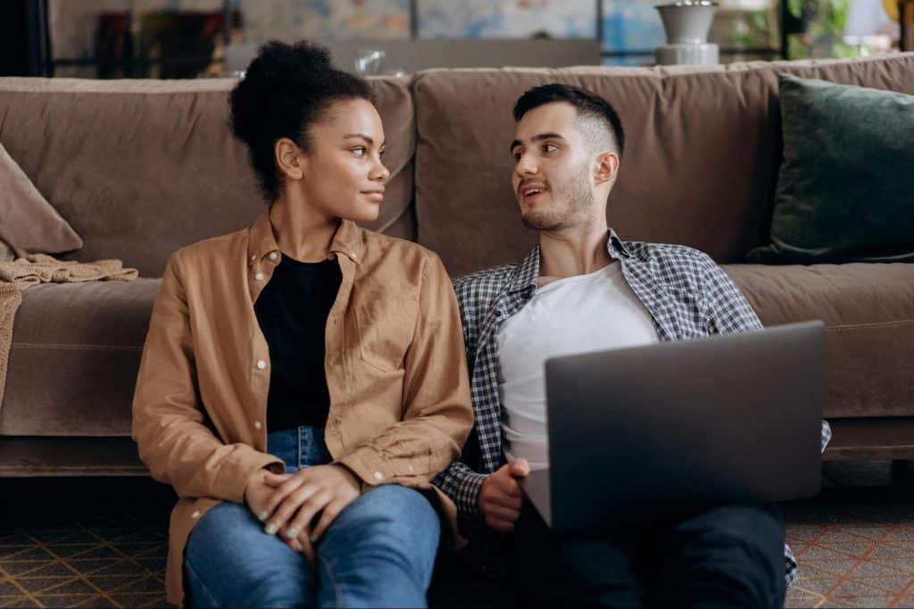 A man and woman looking at each other