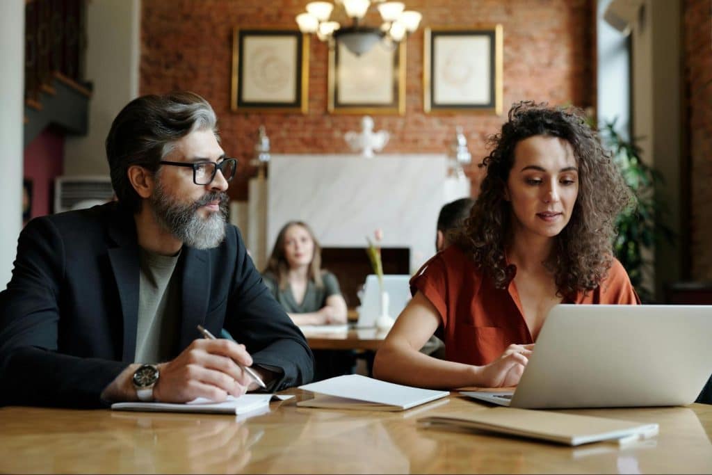 A man and woman busy