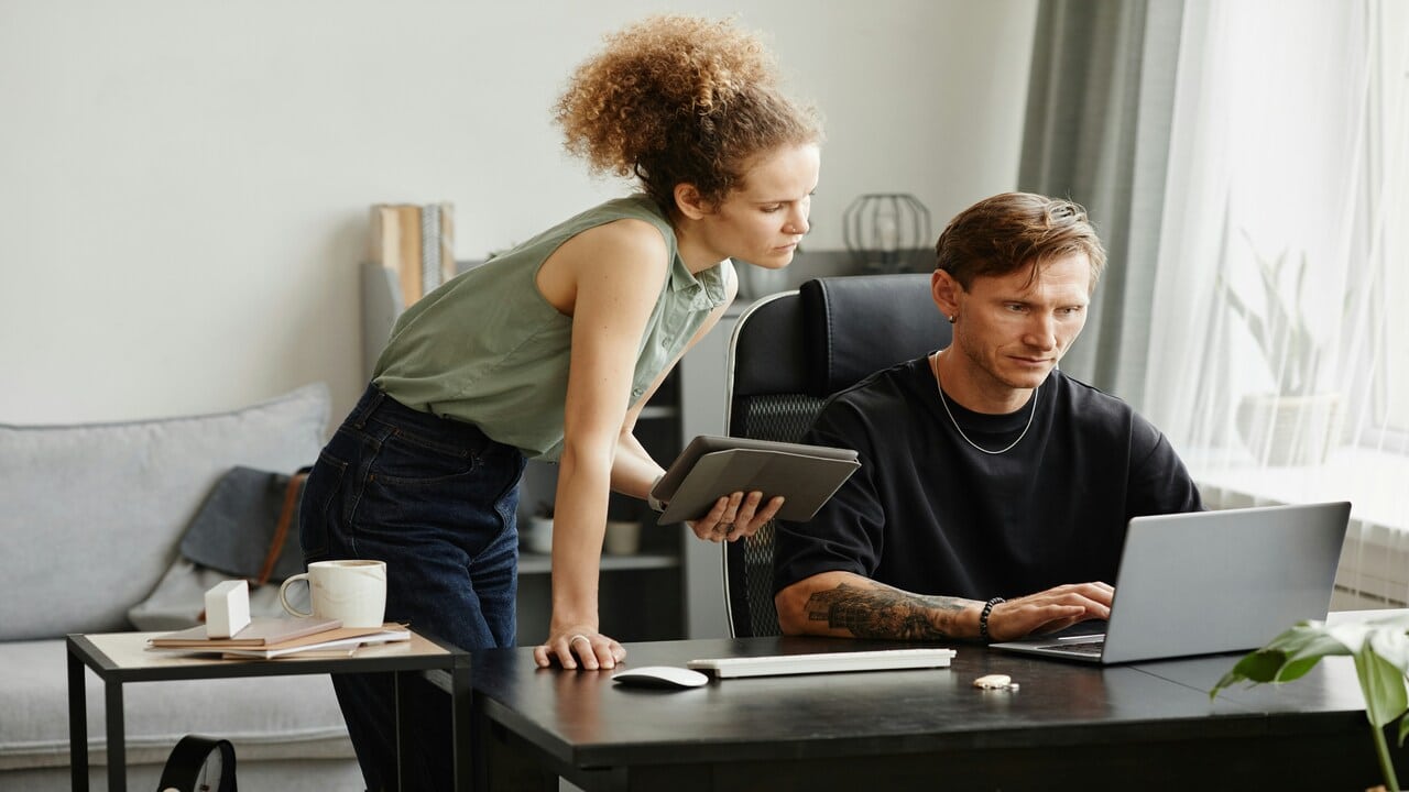 A couple busy working together