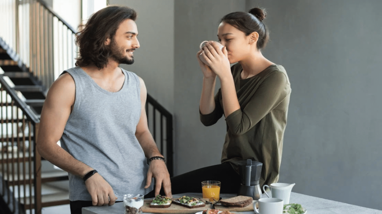 A couple talking during breakfast