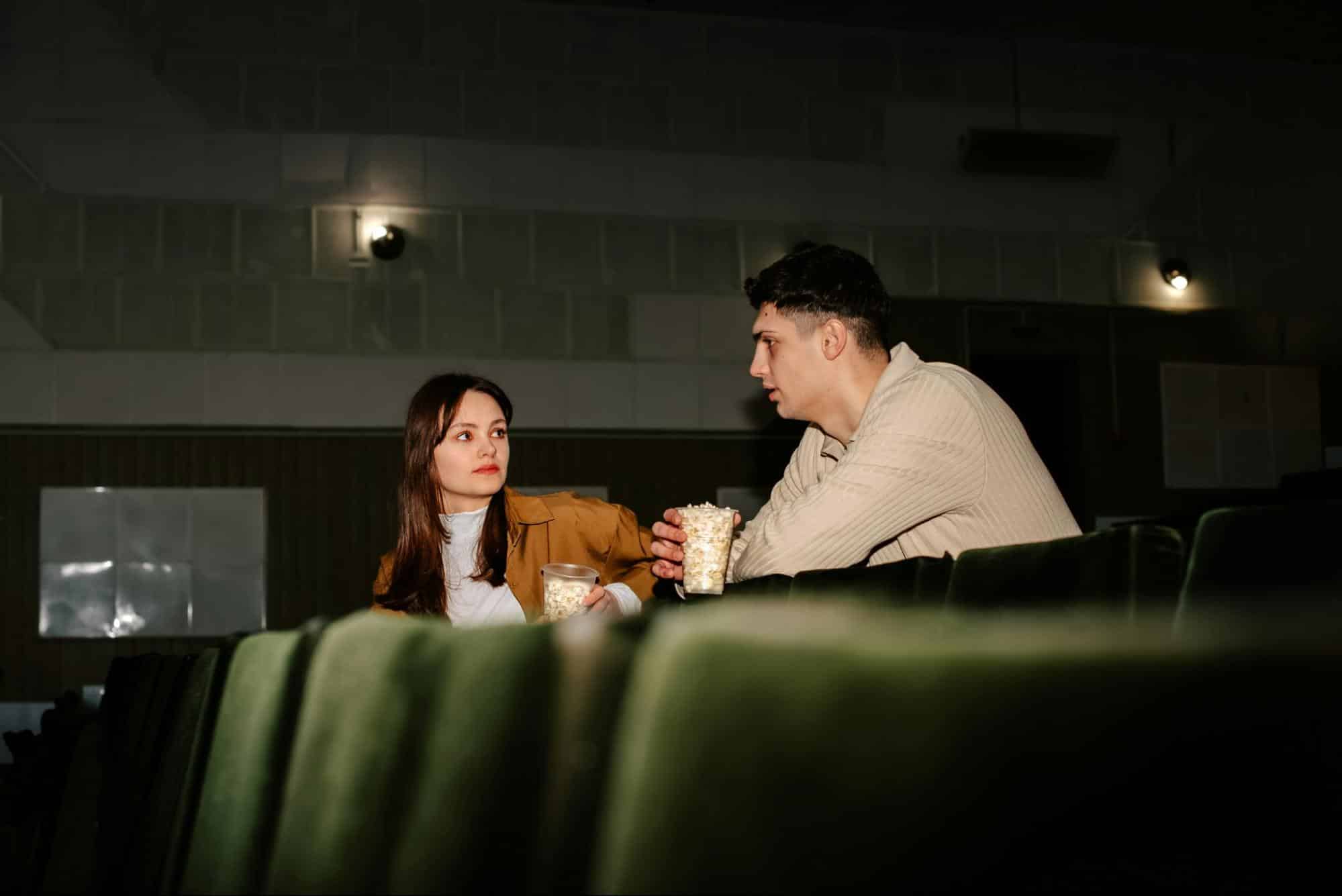 A man and woman looking at each other