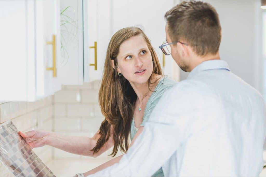 A man and woman looking at each other
