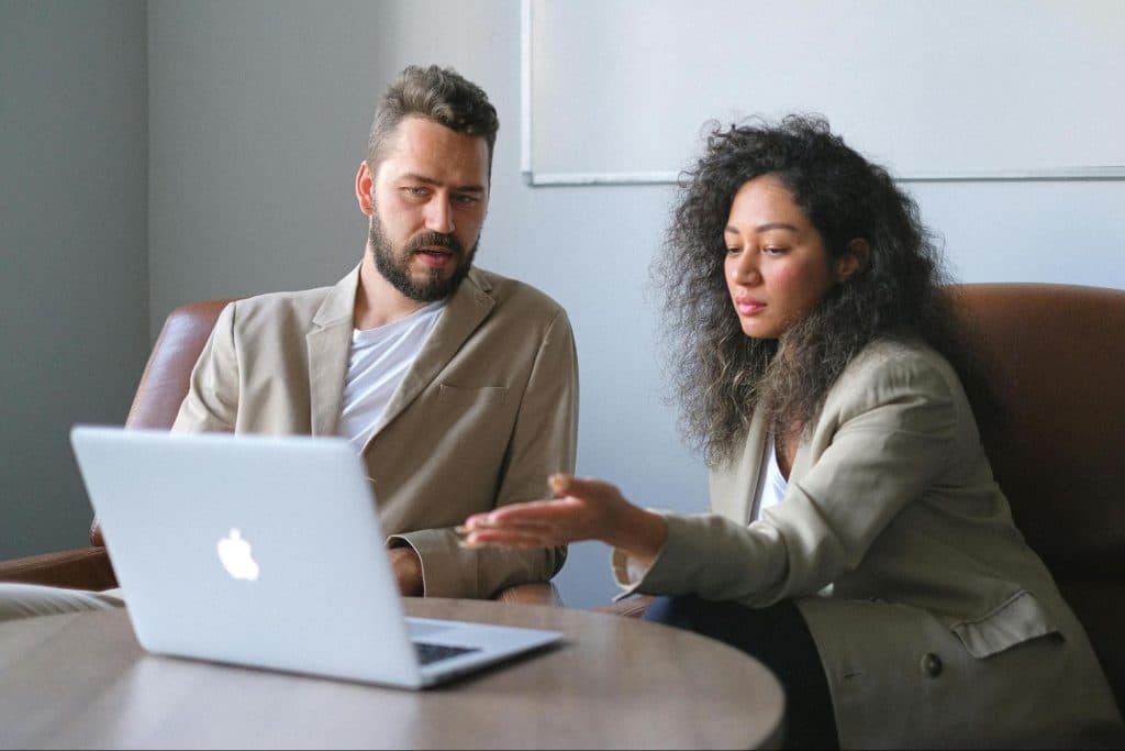 A man and woman talking