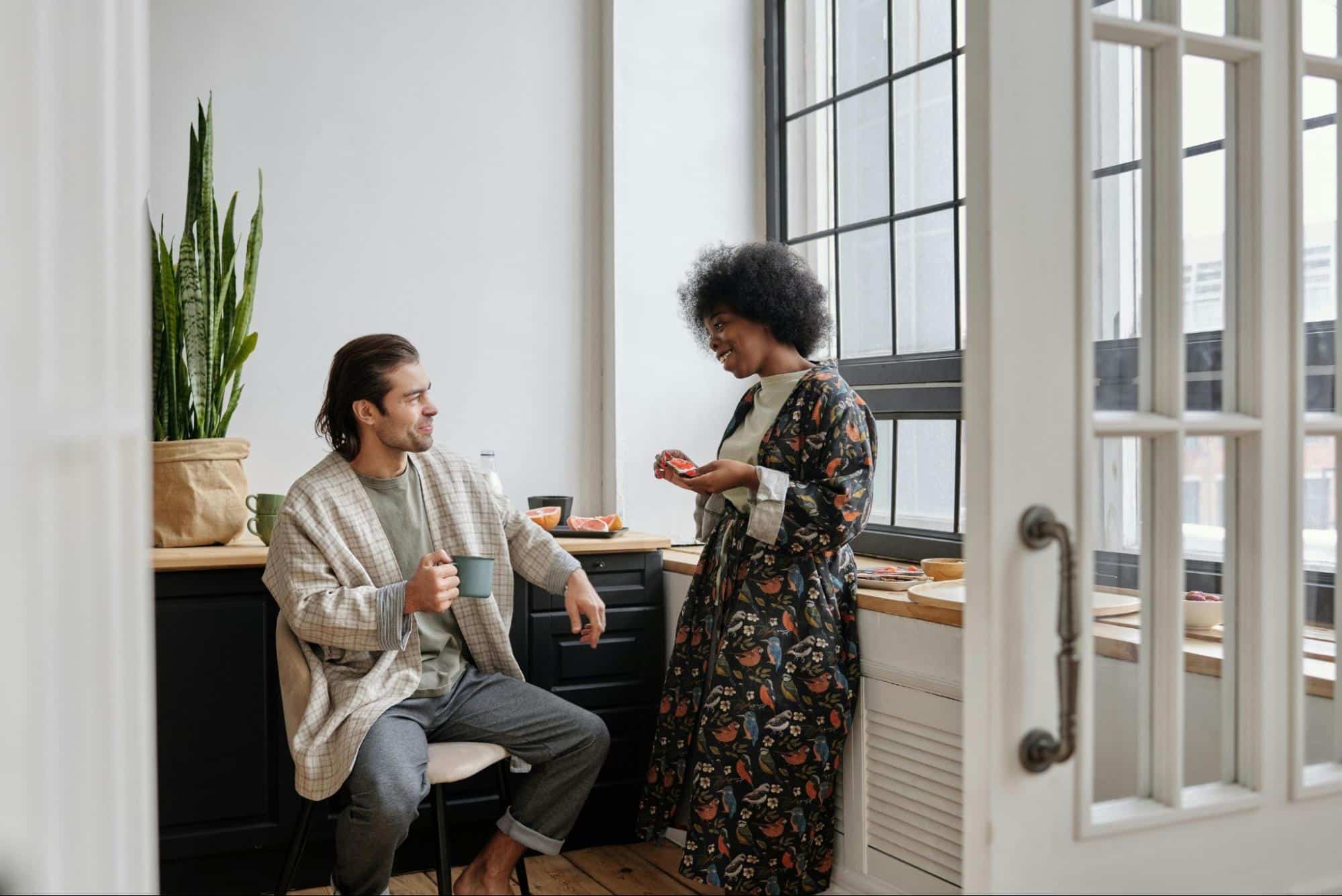 A man and woman having breakfast together