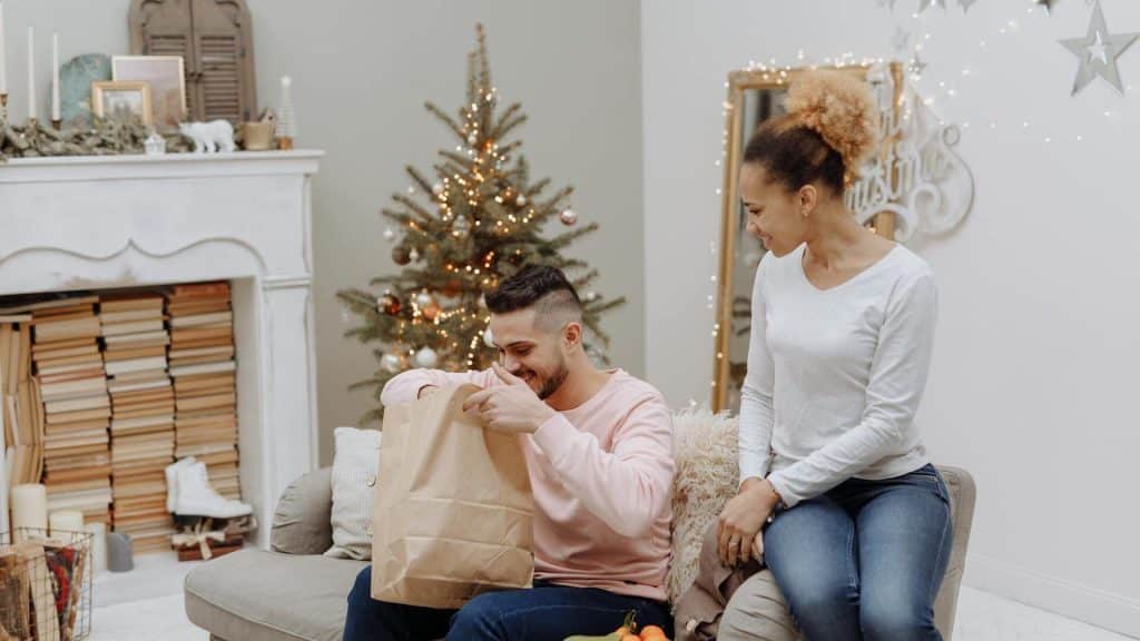 A couple sitting on the couch.