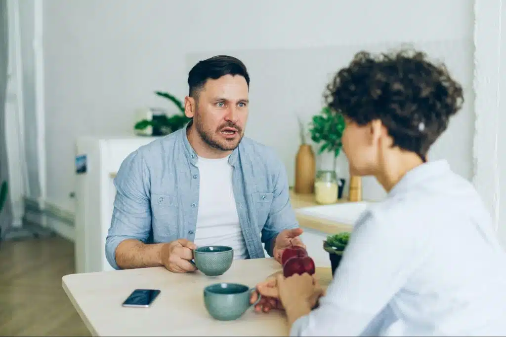 A man getting angry at the woman