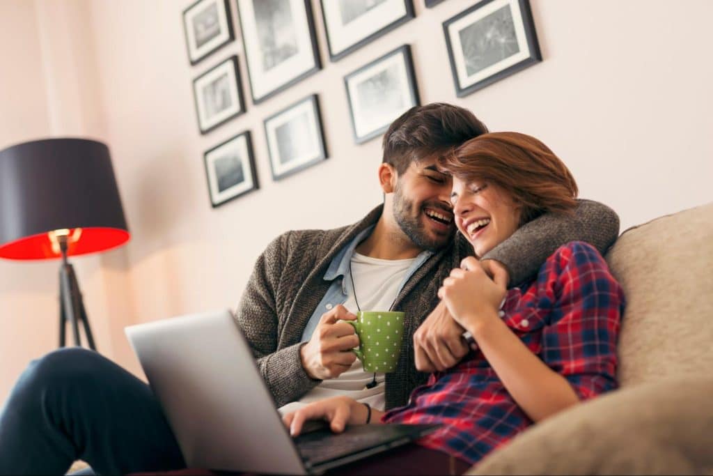 A man and woman at the couch