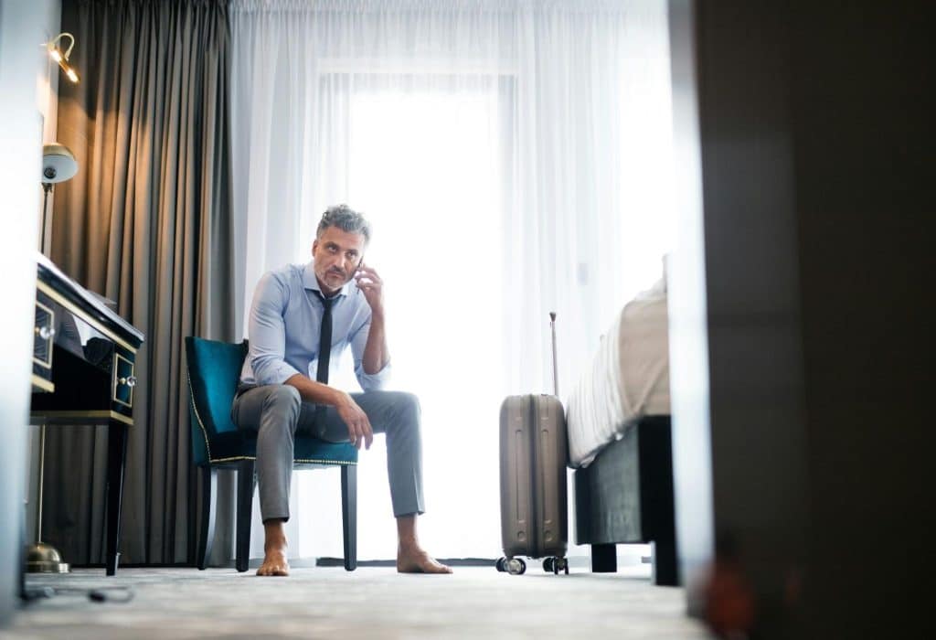 A man alone and sitting 