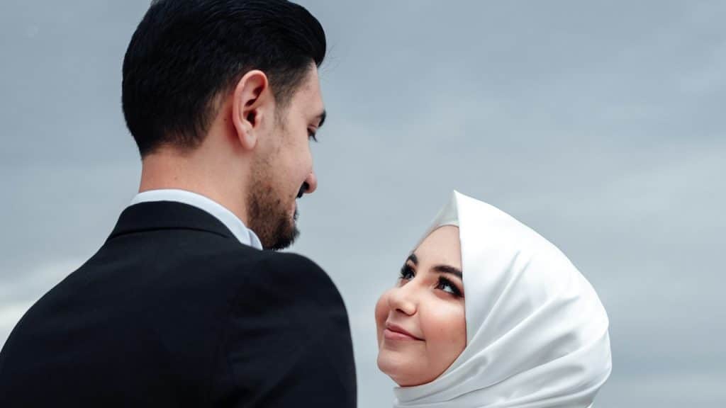 A man and woman holding each other.