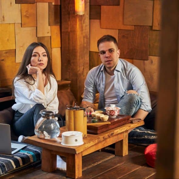 A man and woman sitting