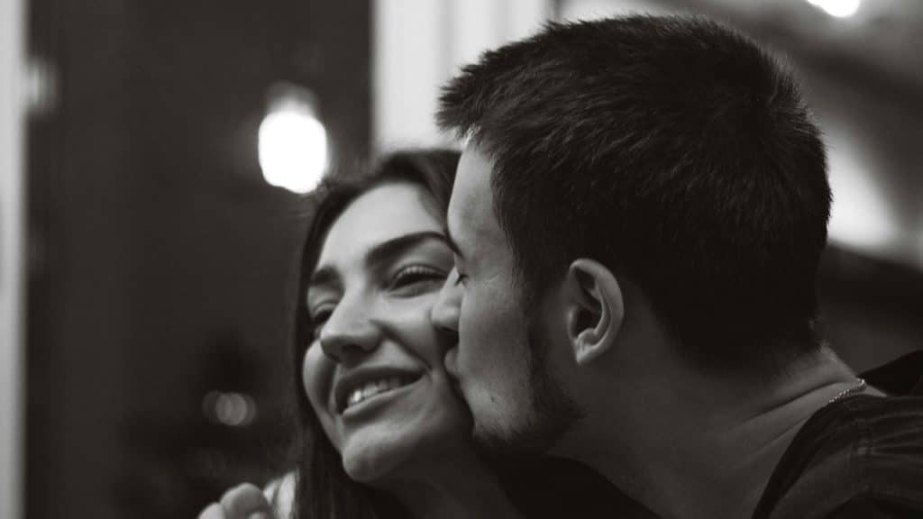 A black-and-white photo of a man and a woman.