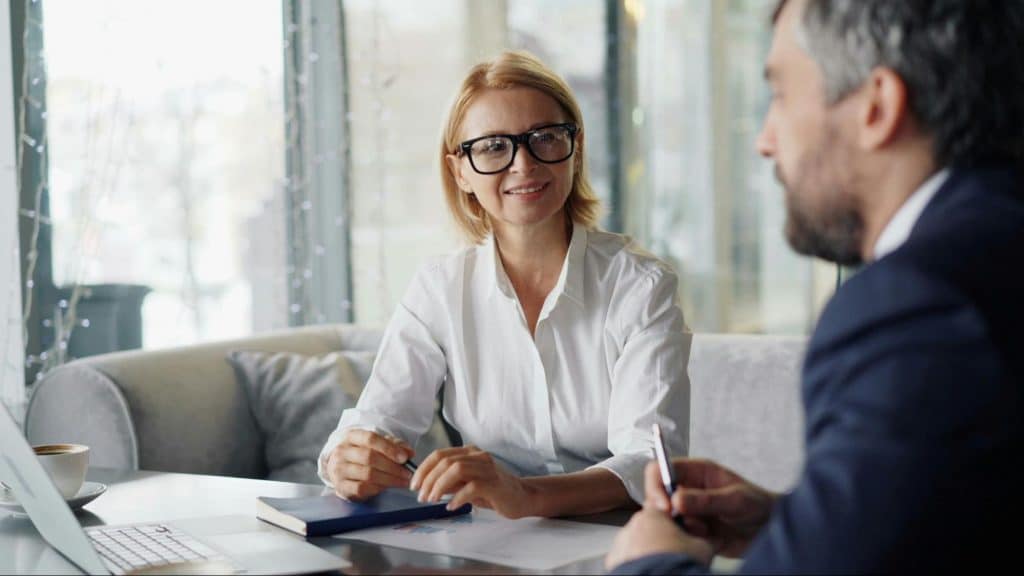 A man and woman talking