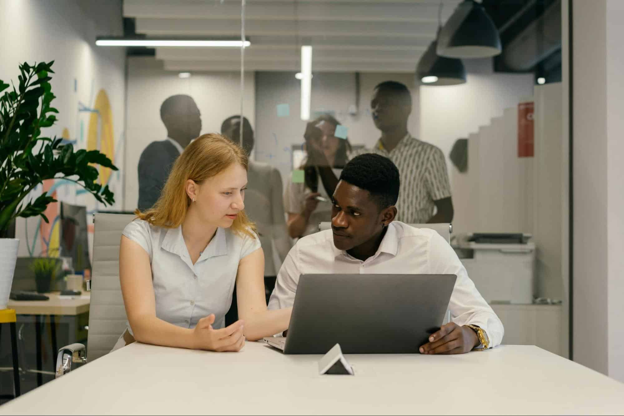 A man and woman working together