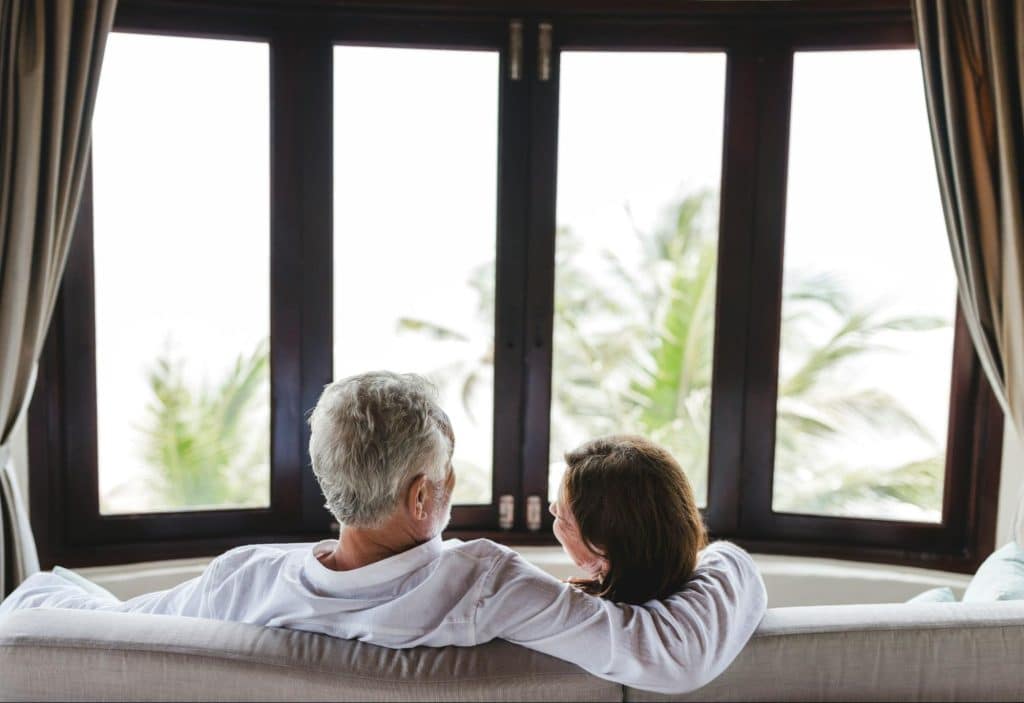 A man and woman looking at each other