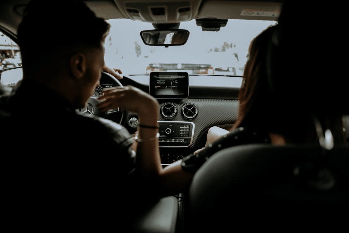 A man driving a car