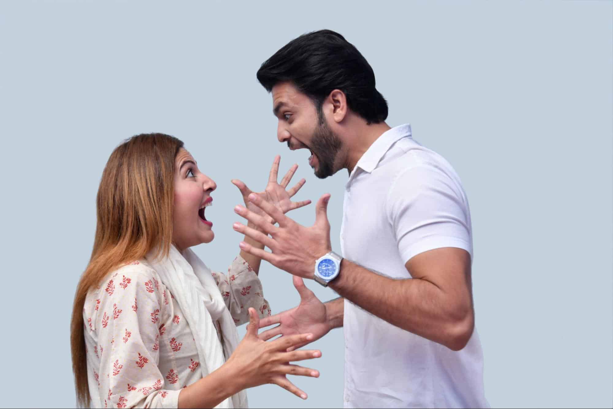 A man and woman shouting at each other