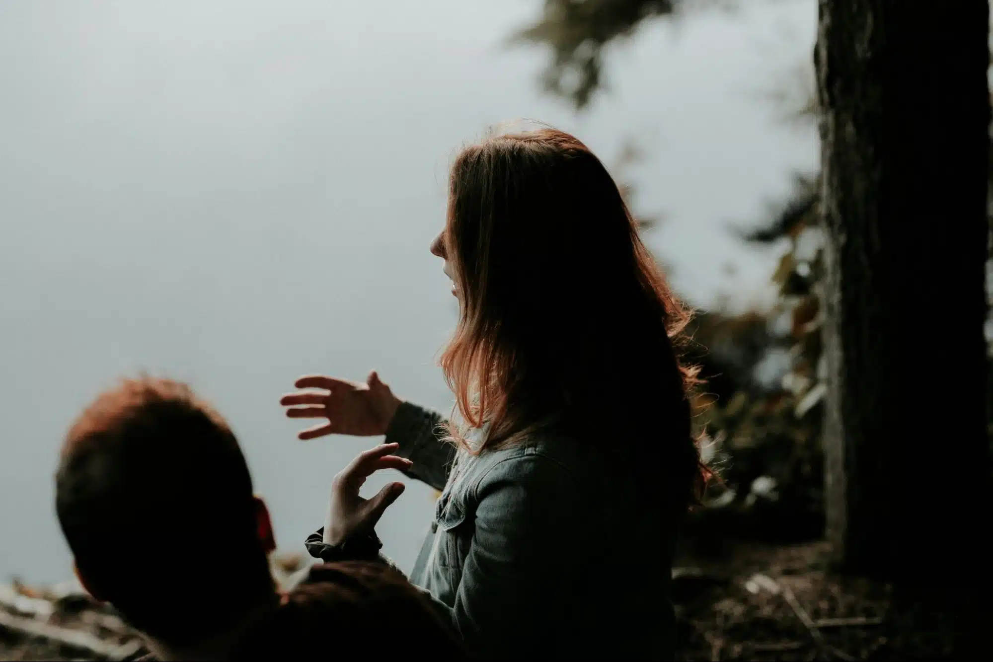 A man and woman talking 
