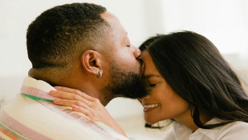A couple saying βgood nightβ
