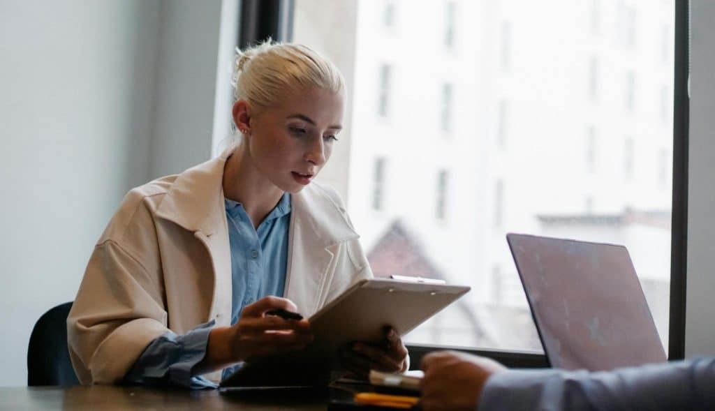 A woman looking at the tablet