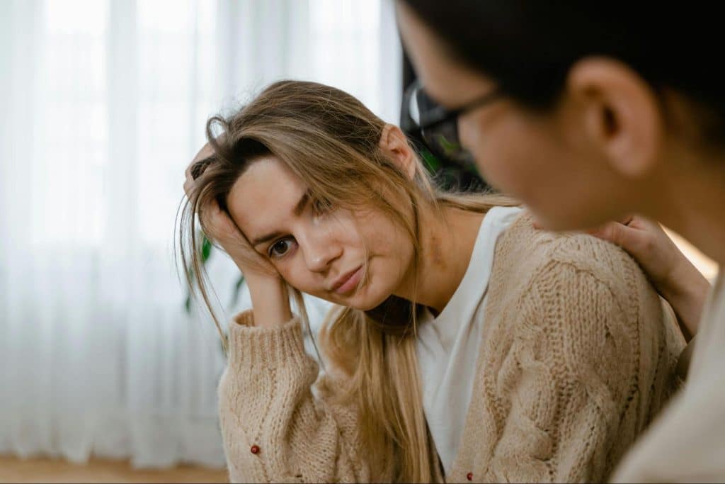 A woman looking disappointed