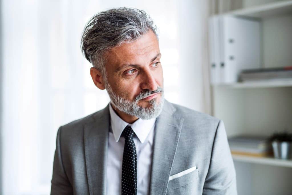 A man looking away.