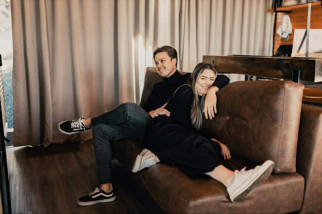 A man and woman at the couch