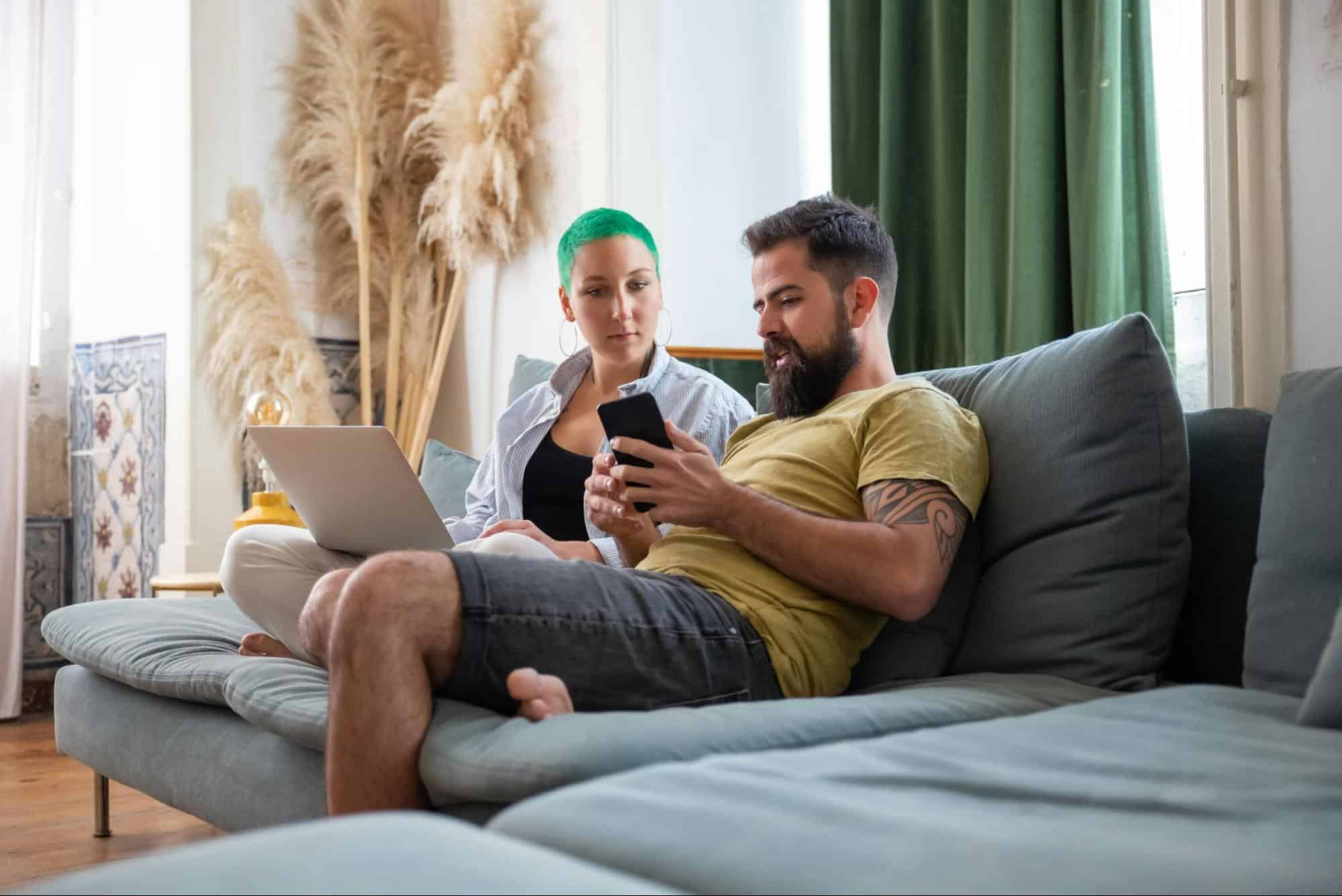A man showing something to woman