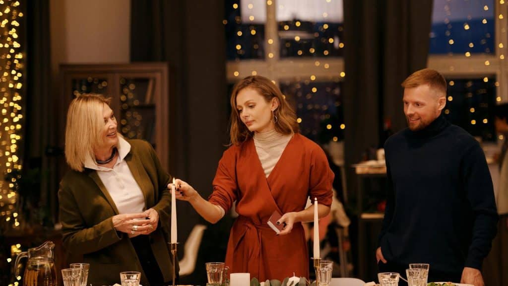 A family preparing a Christmas dinner.