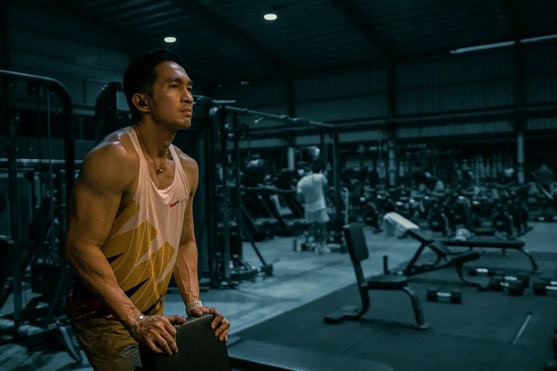 A Man working out in gym.