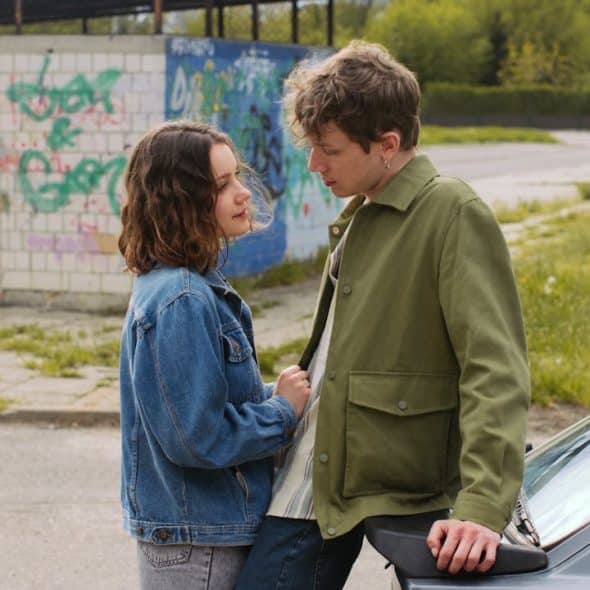 A man and woman close to each other