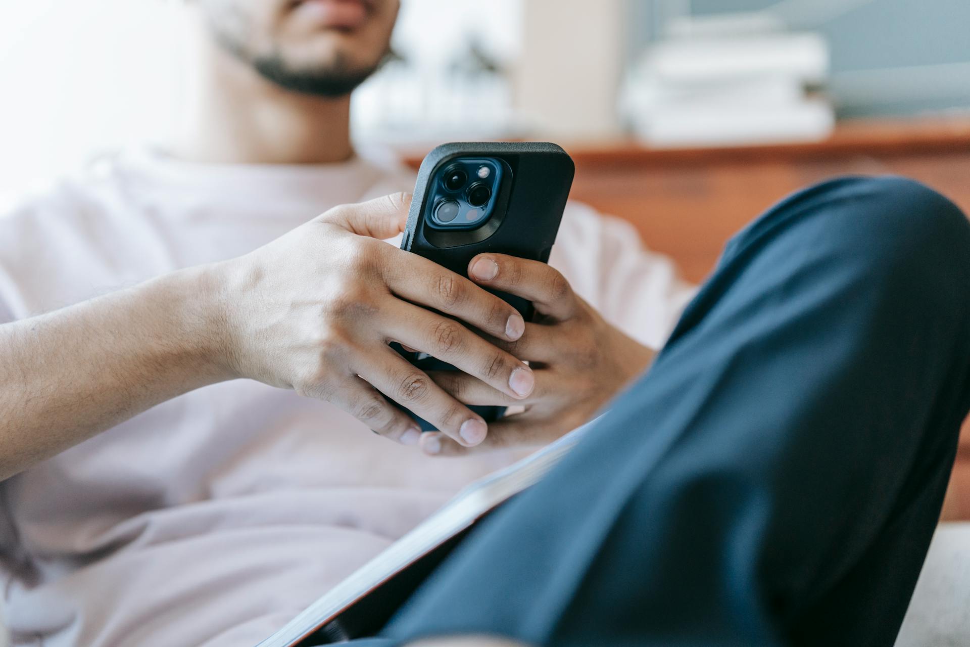 A man checking out his phone