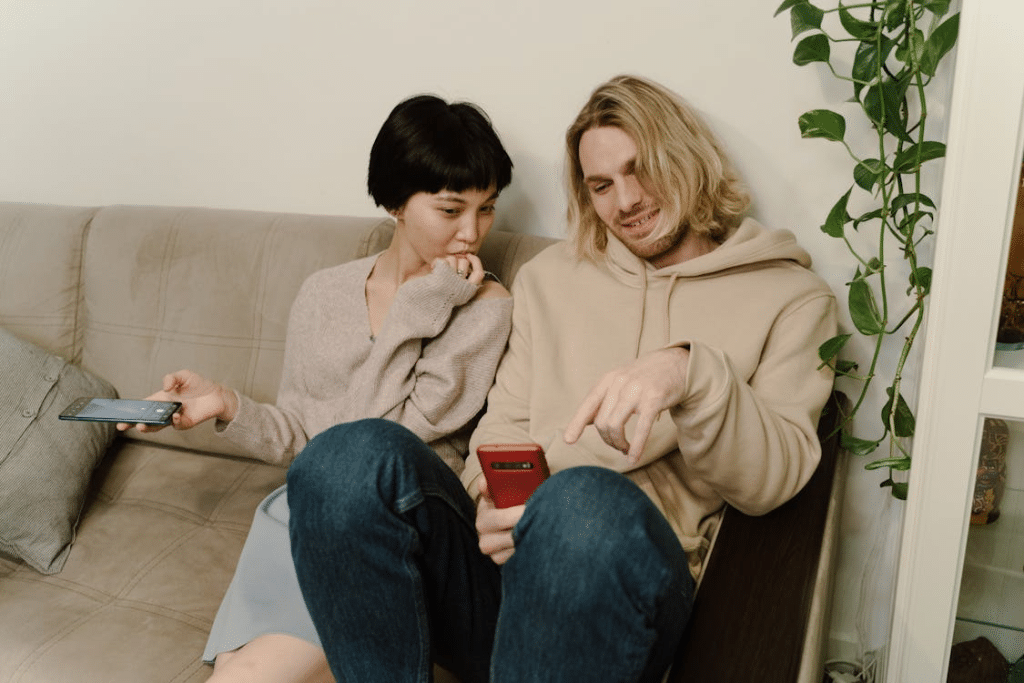 A couple sitting on a couch