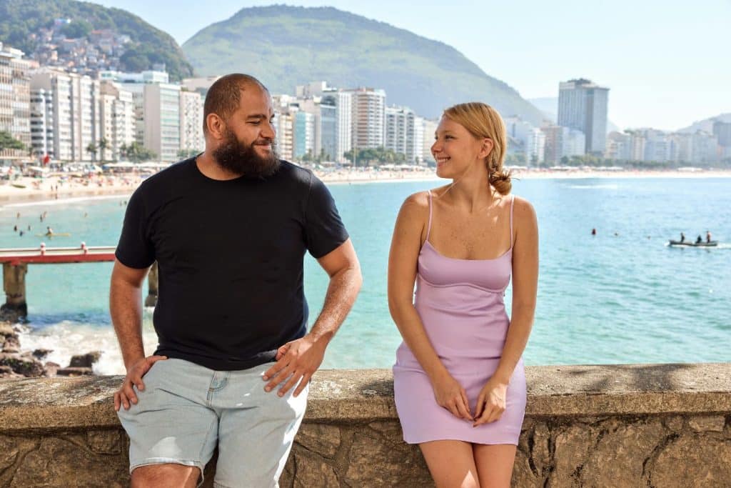 A man and woman looking at each other
