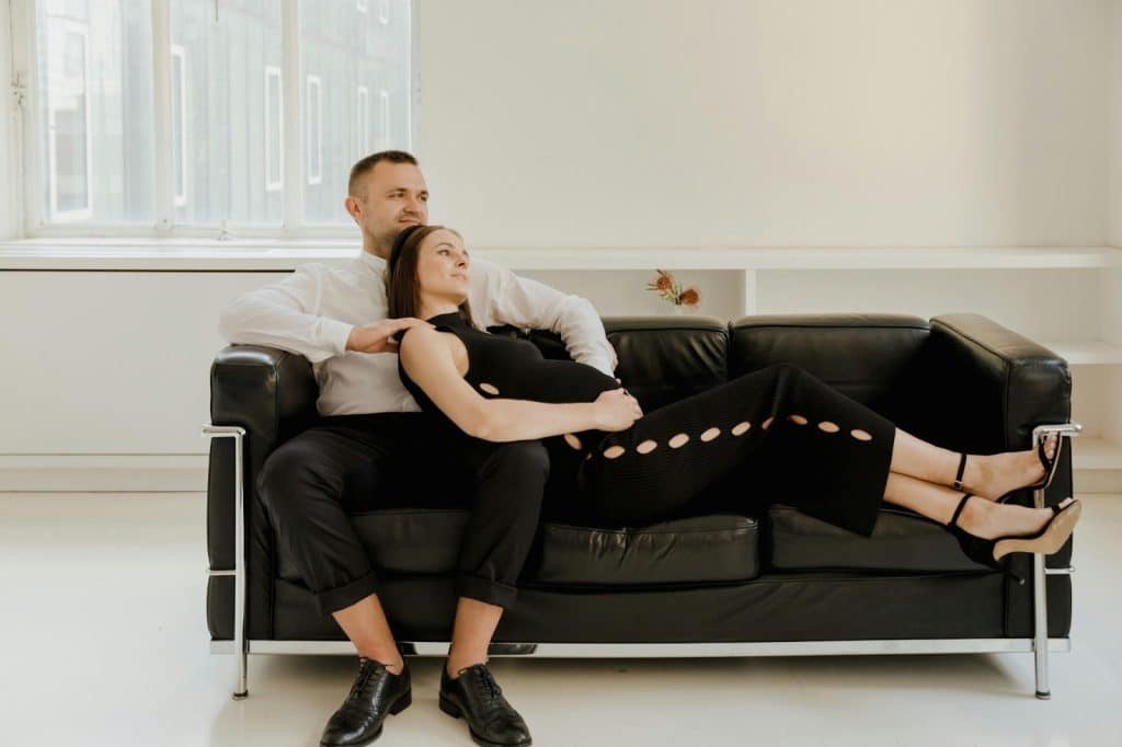 A man and woman at the couch