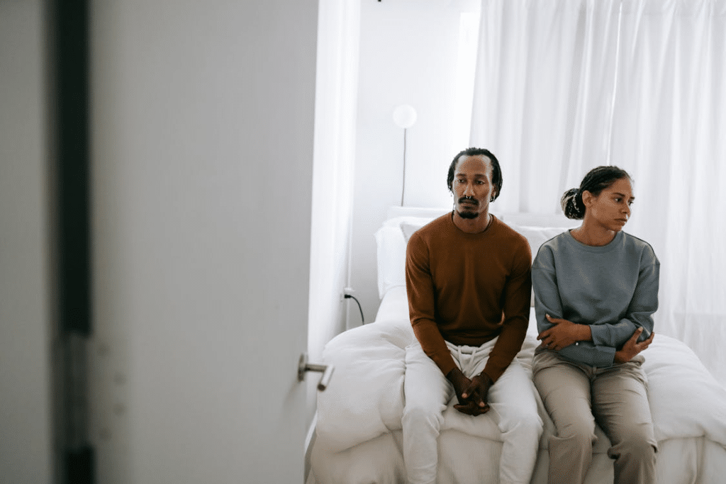 Sad couple in the bedroom