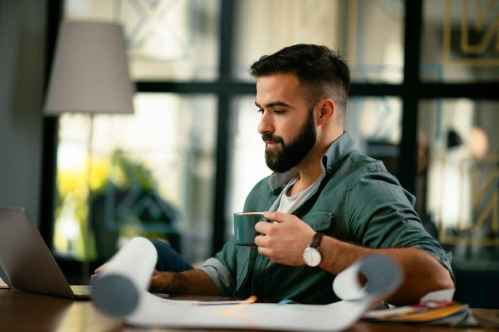 A man drinking a coffee