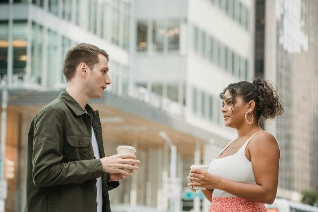 A man looking at the woman