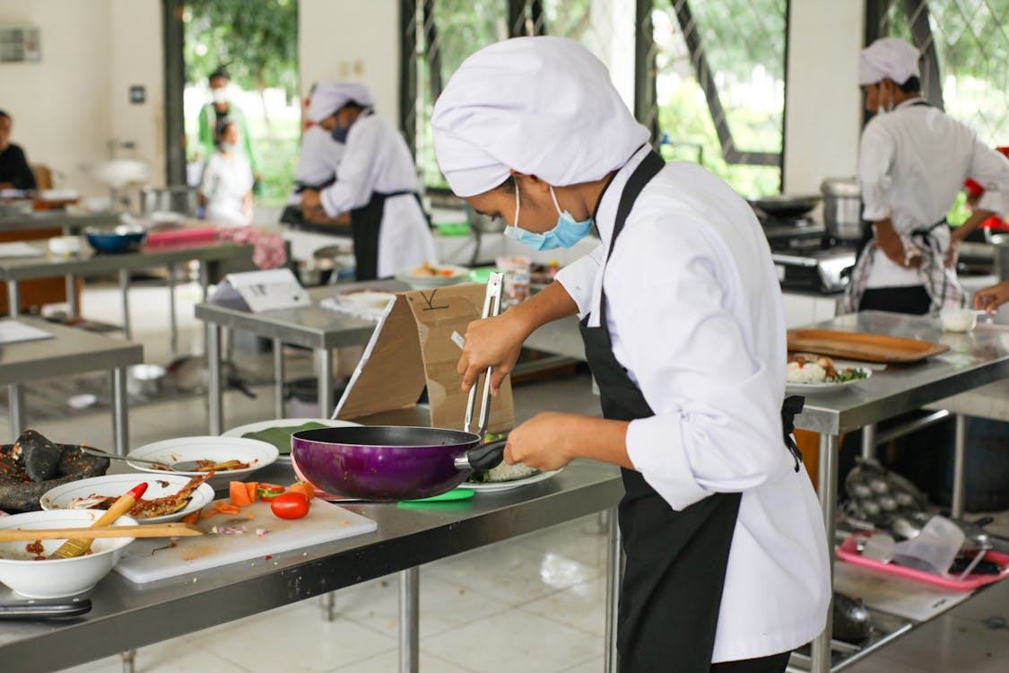A group of people cooking