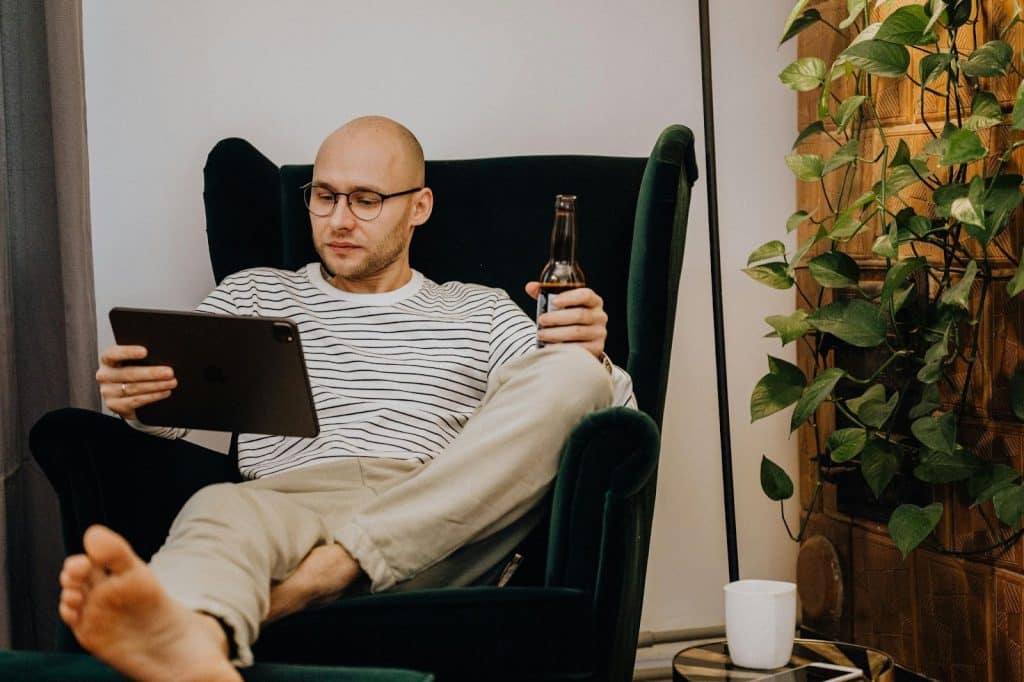 A man sitting at the couch