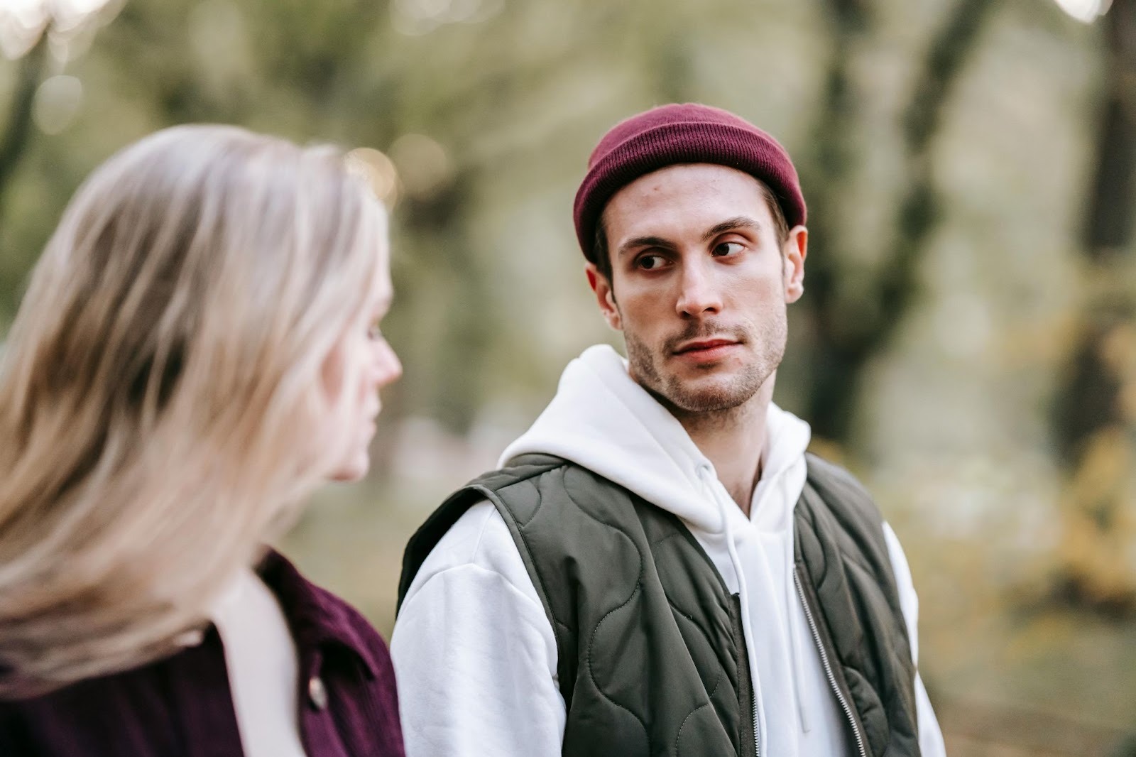 A man looking at the woman