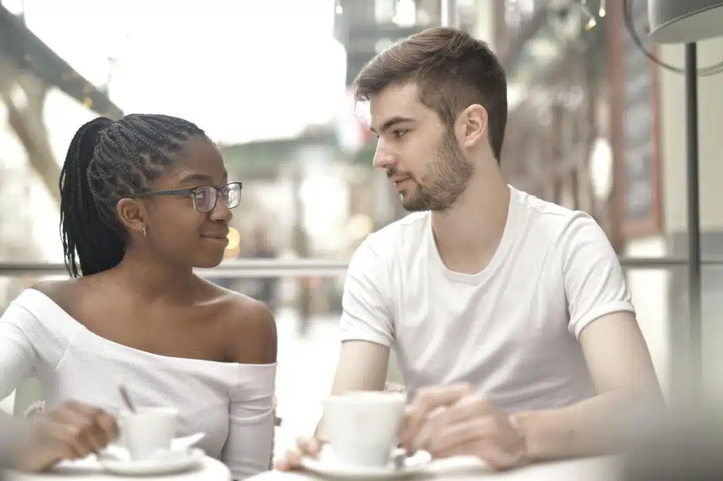 A man and woman talking