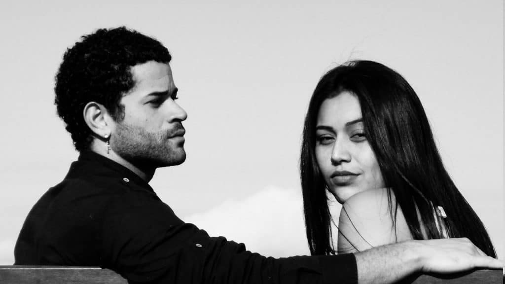 A man and woman standing side-by-side.