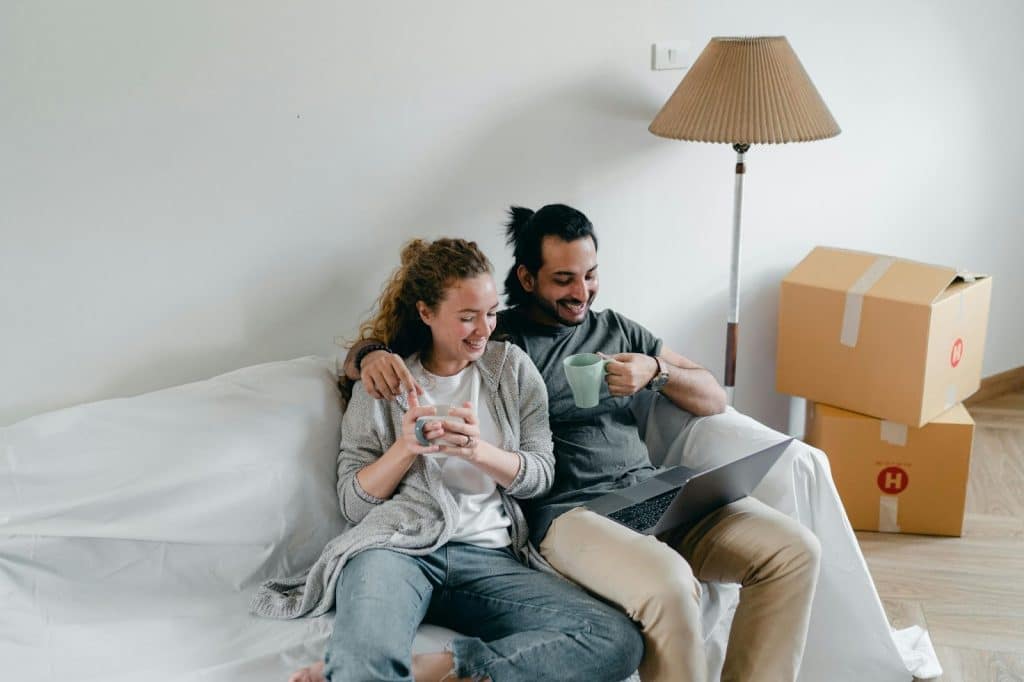 A man and woman at the couch