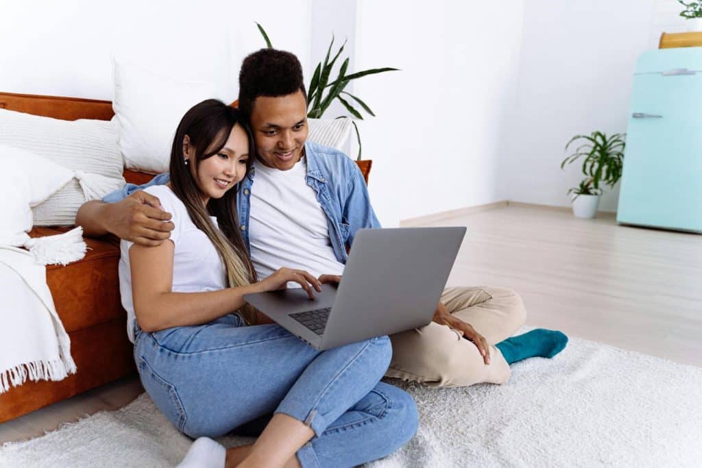 A man and woman watching a movie